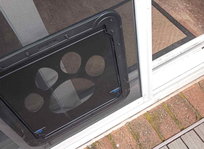 We install dog doors on screen doors